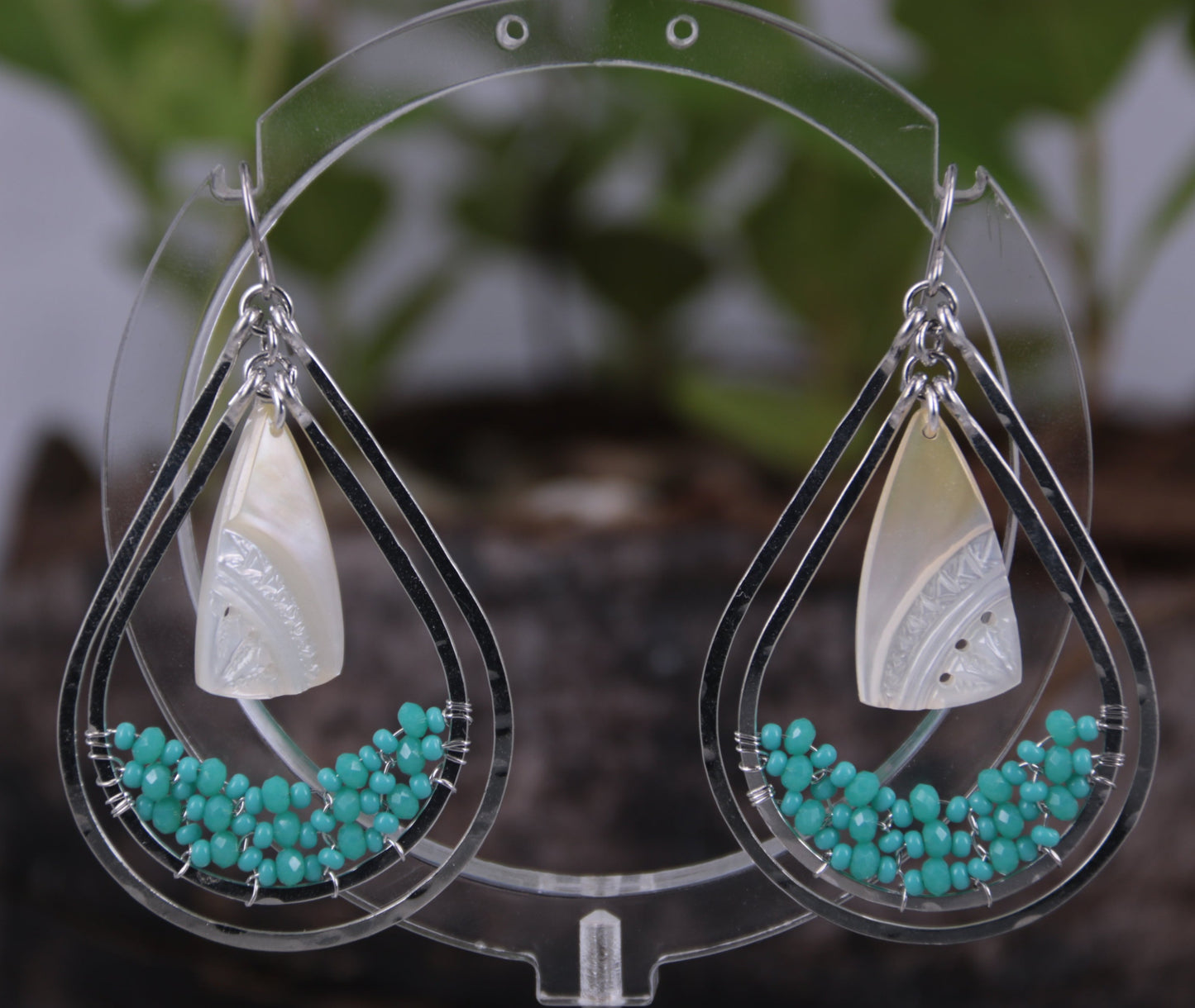 bohemian earrings with tahitian mother of pearl and maori designs by Prokop Tahiti